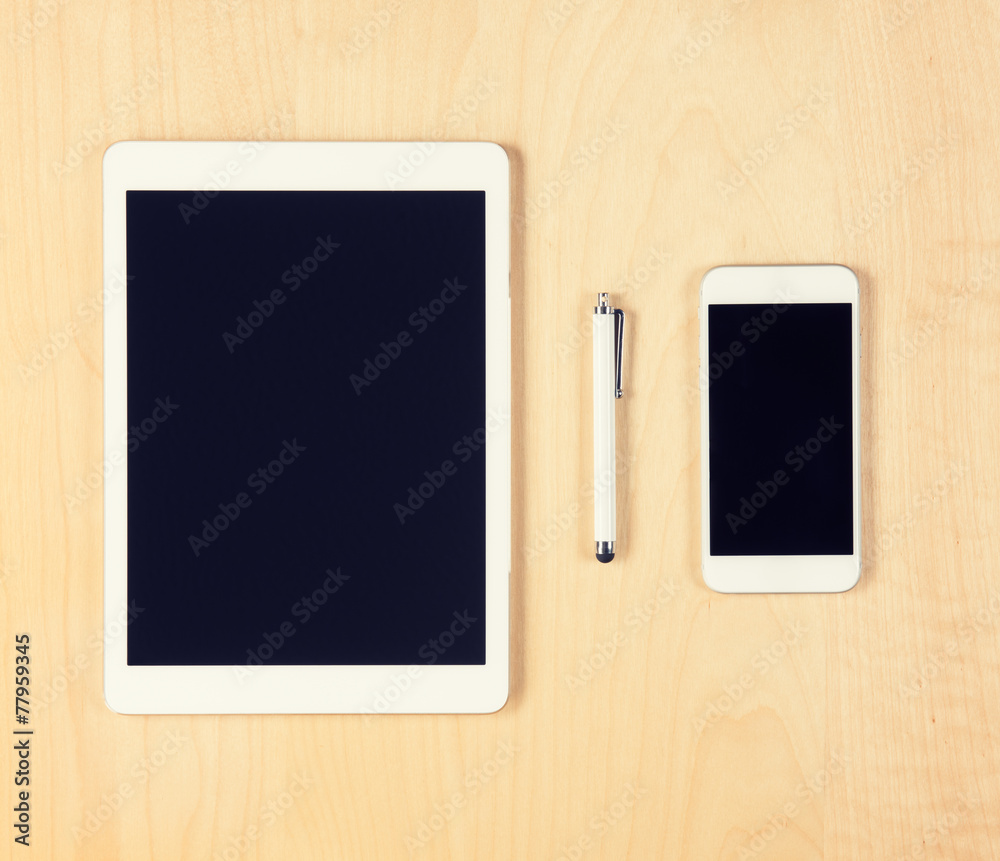 Office table with digital tablet and smartphone. Top view Office table with digital tablet and smartphone. Top view