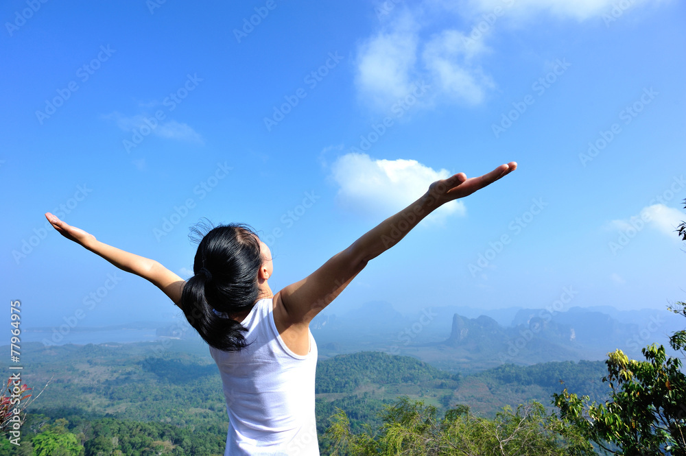 strong confident woman hiker open arms at on mountain peak rock strong confident woman hiker open arms at on mountain peak rock