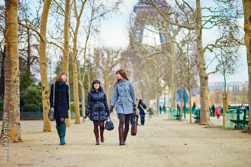 Three girls near the Eiffel tower