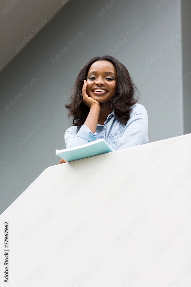 low angle view of young african college girl low angle view of young african college girl