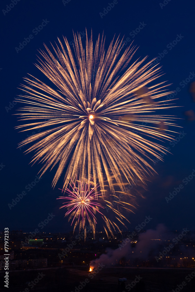 several outbreaks of fireworks on background of dark sky several outbreaks of fireworks on background of dark sky