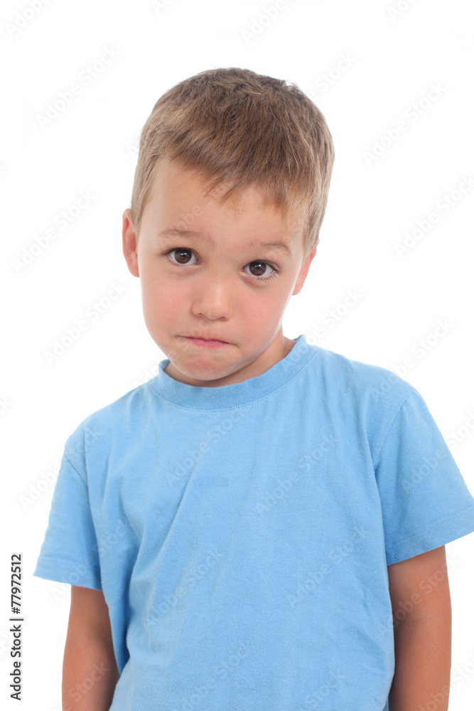 shy little boy with guilty and sorry look on a white background shy little boy with guilty and sorry look on a white background