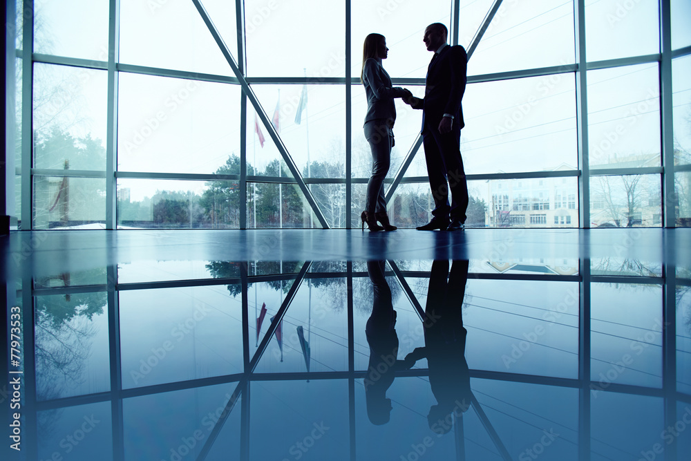Handshaking in office Handshaking in office