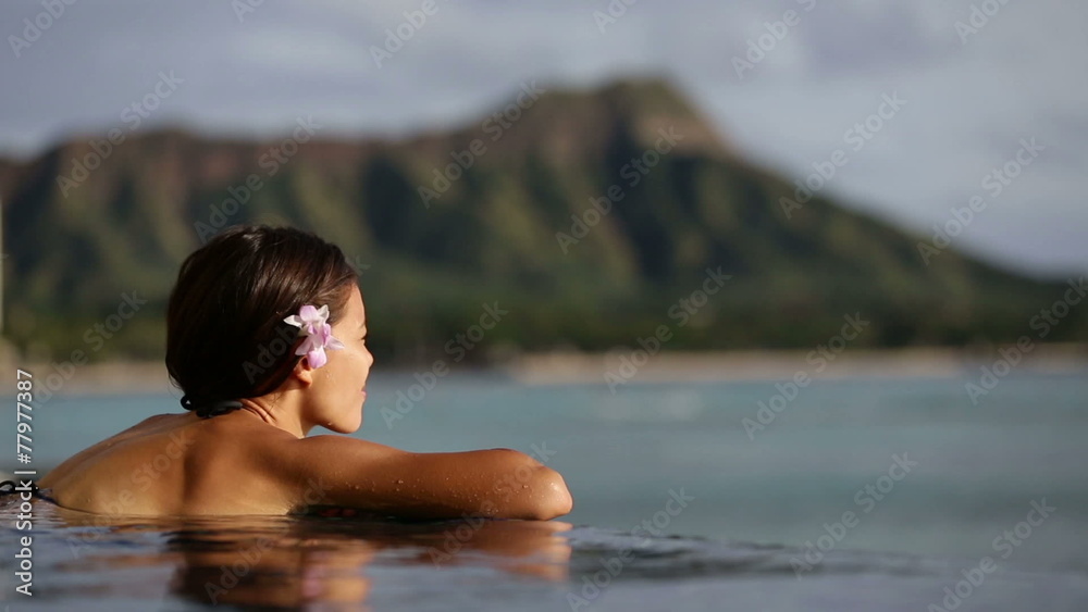 Holiday woman swimming at beach on Hawaii travel Holiday woman swimming at beach on Hawaii travel