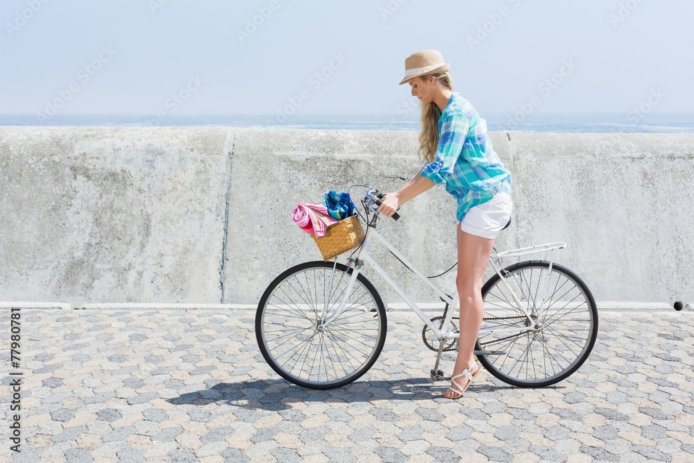Fototapeta premium Cute blonde on a bike ride