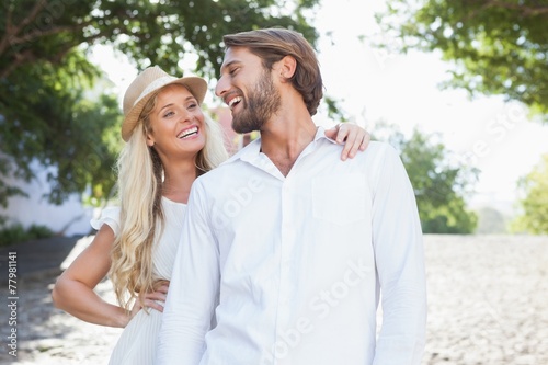 Cute couple standing and smiling