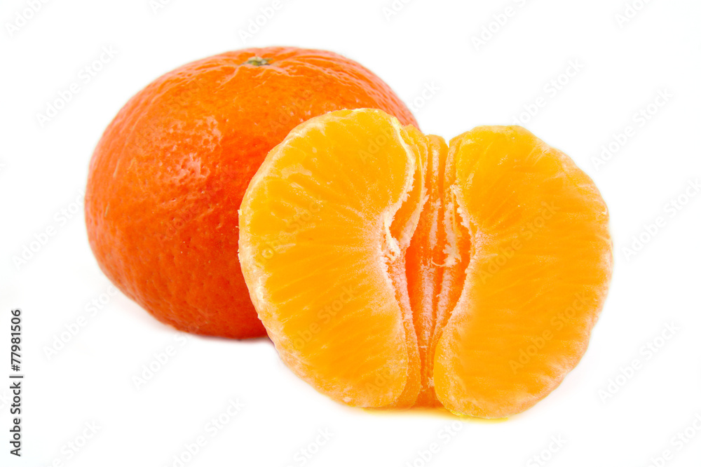 Closeup view of one and a half tangerine, orange fruit, citrus