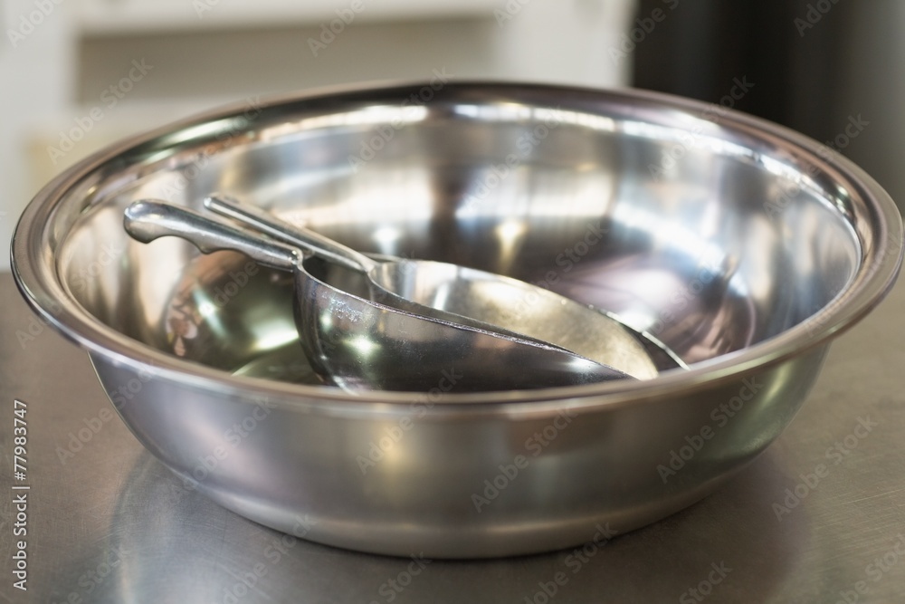 Mixing bowls and scoops on counter Mixing bowls and scoops on counter