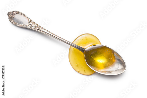 sweet honey in silver spoon