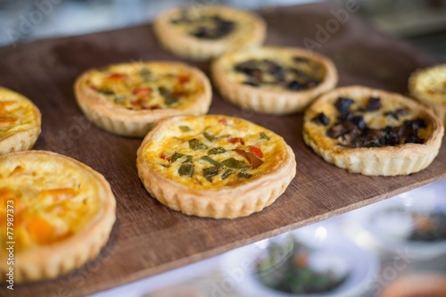 Delicious mini quiches on tray