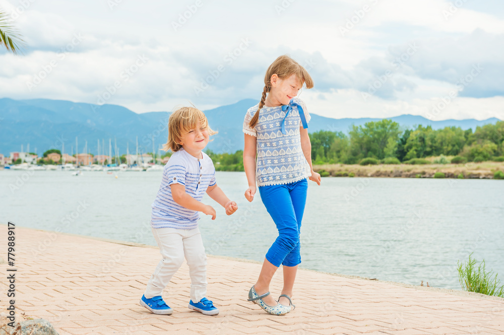 Adorable kids having fun outdoors Adorable kids having fun outdoors