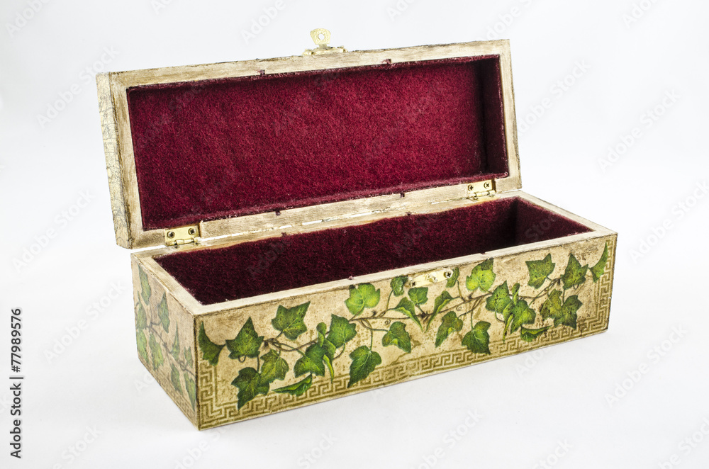 Open box with handmade floral motif.