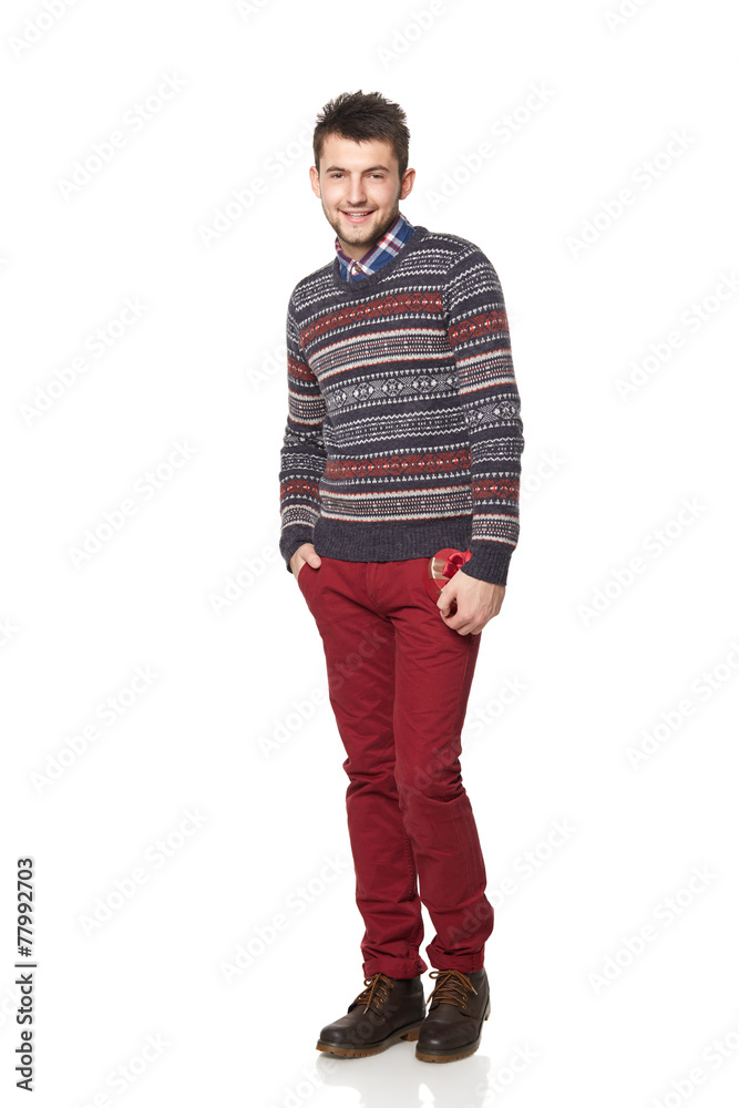 Young man with a heart-shaped gift isolated on white background. Young man with a heart-shaped gift isolated on white background.