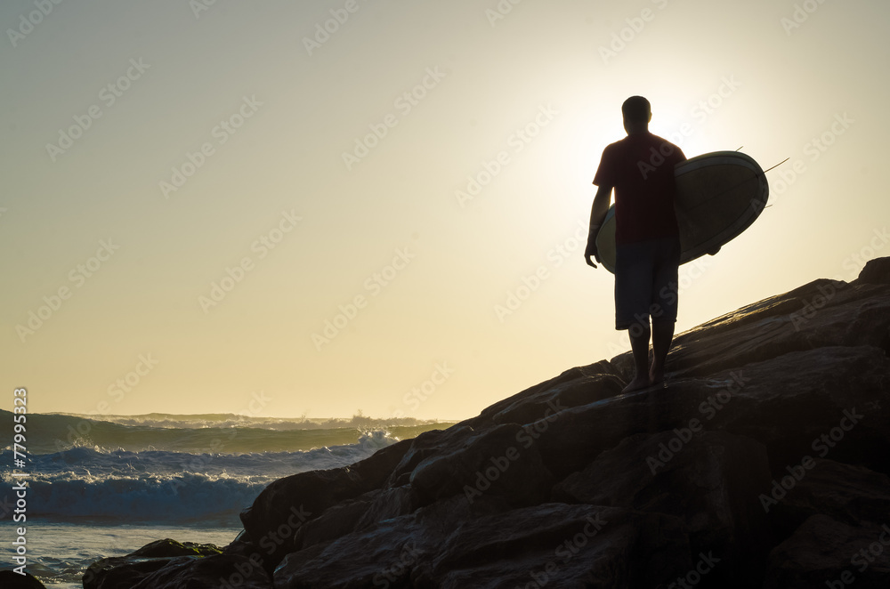 Surfer watching the waves