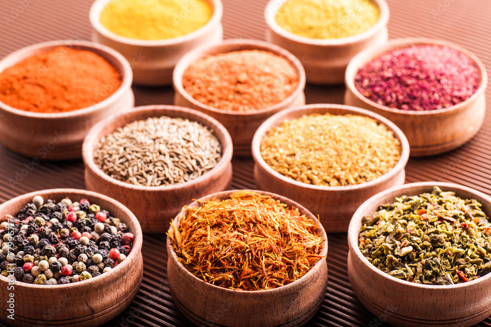 set spices in a wooden bowl close-up