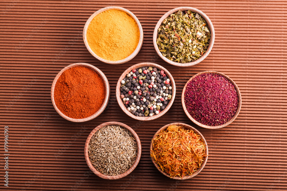 set dry spices in a wooden bowl