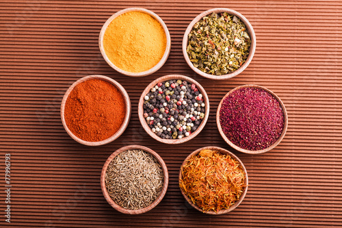 set dry spices in a wooden bowl