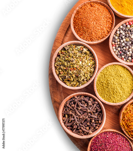 Fototapeta Naklejka Na Ścianę i Meble -  assorted spices in a wooden bowl