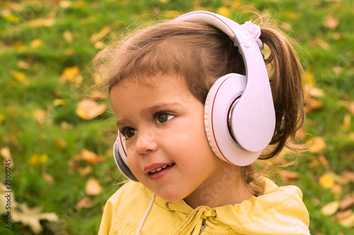 girl listening music with headphones