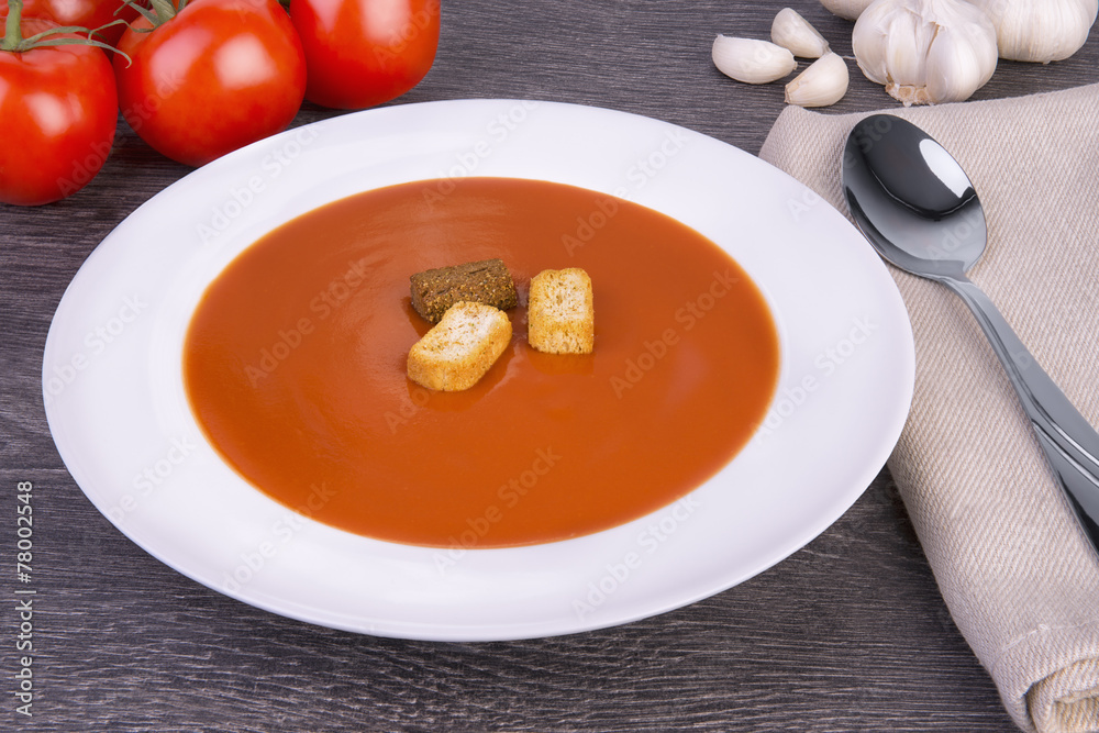 Fresh tomato soup in a white bowl Fresh tomato soup in a white bowl
