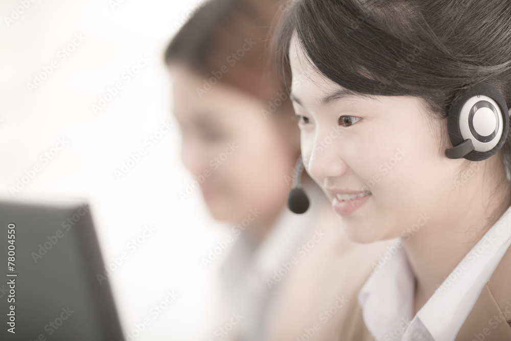 Asian women call center with phone headset Asian women call center with phone headset