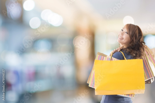 Cheerful shopping woman