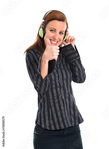 Business woman listening music