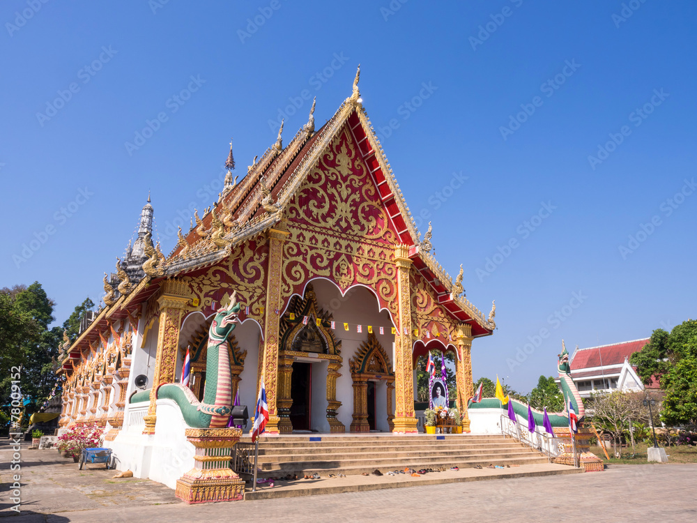 Northern Thai art temple under blue sky