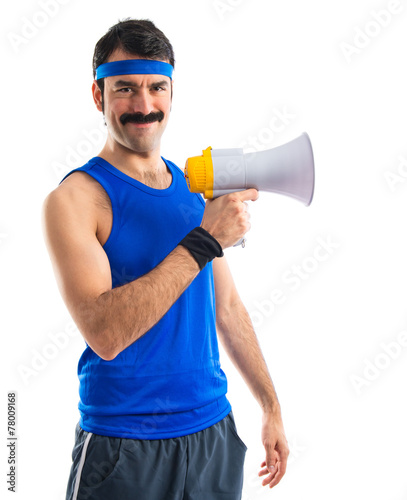 Sportman shouting by megaphone