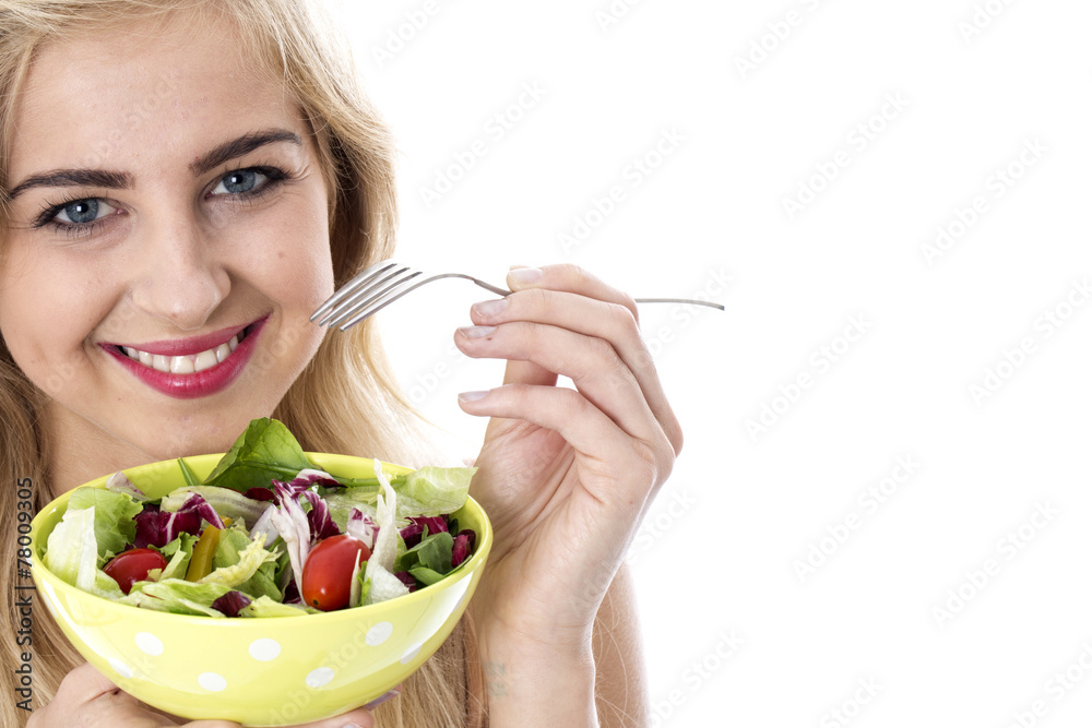 Model Released. Attractive Happy Young Woman Eating Salad Model Released. Attractive Happy Young Woman Eating Salad
