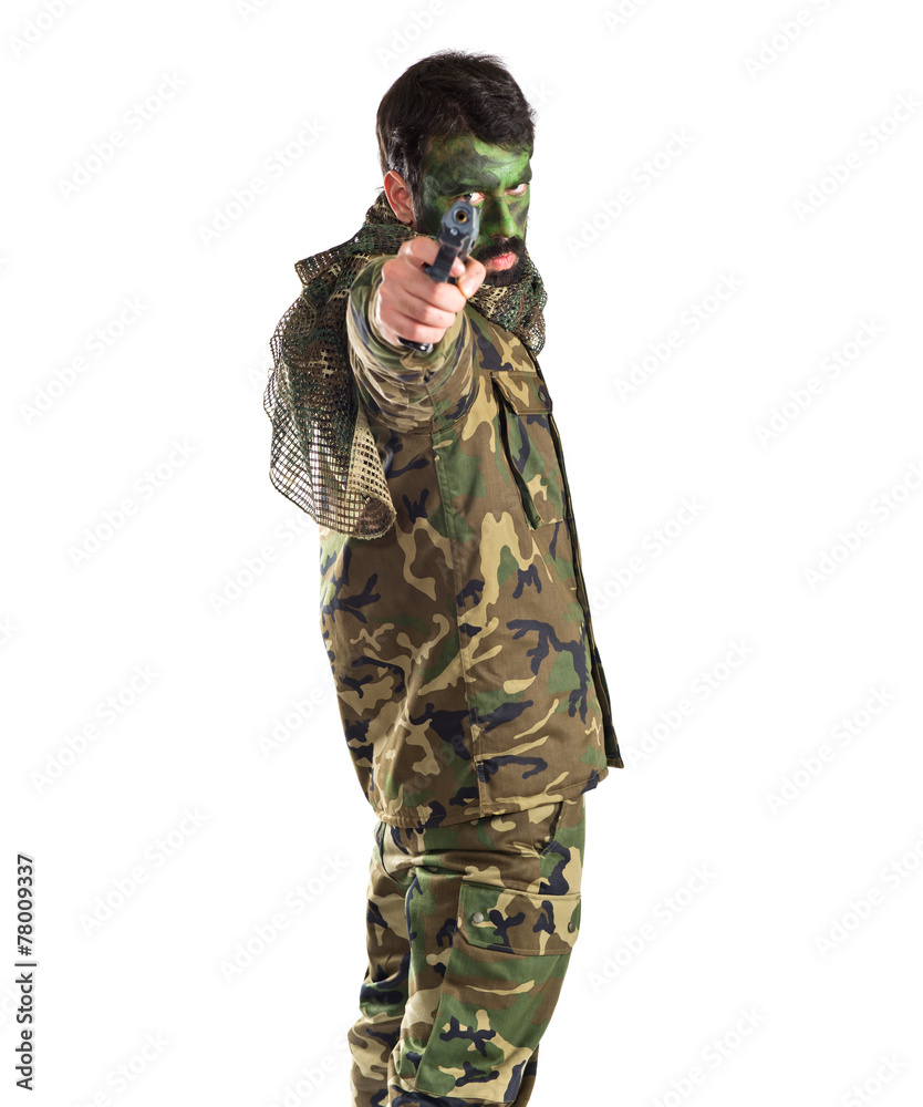 Soldier shooting with a pistol Soldier shooting with a pistol