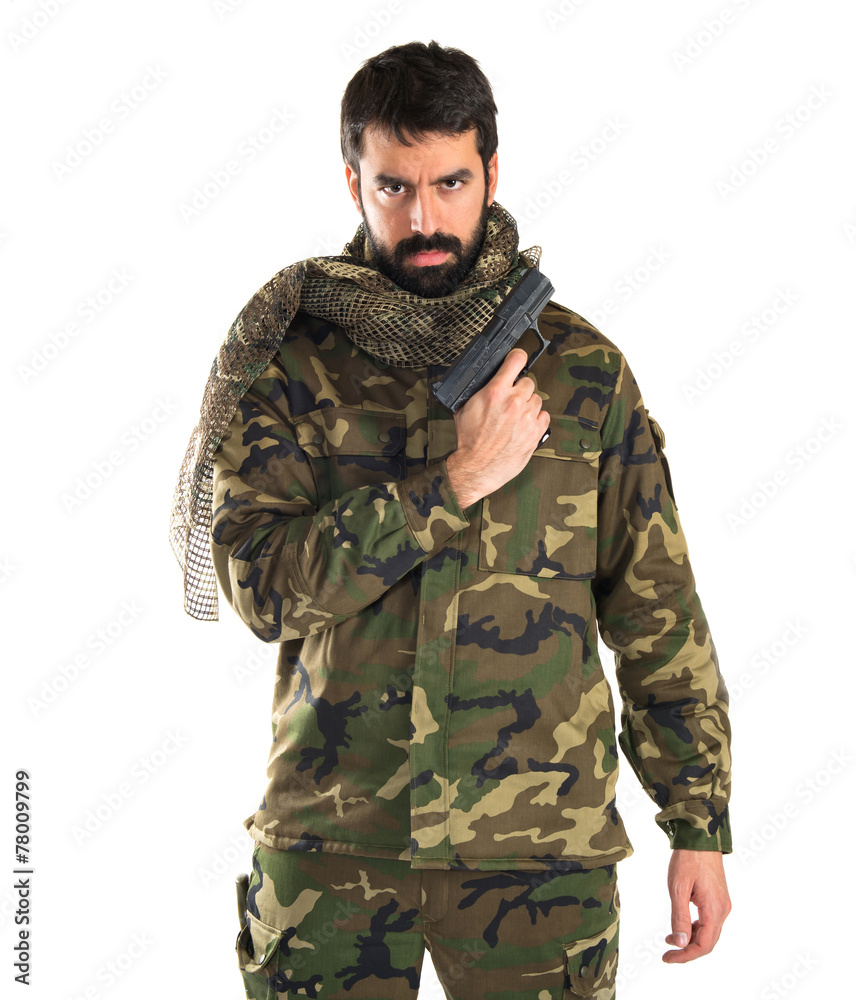Soldier holding a gun Soldier holding a gun