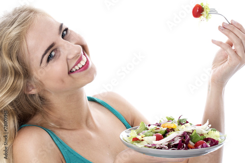 Model Released. Attractive Happy Young Woman Eating Salad