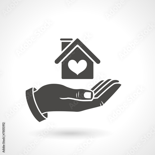 Hand Holding House Symbol
