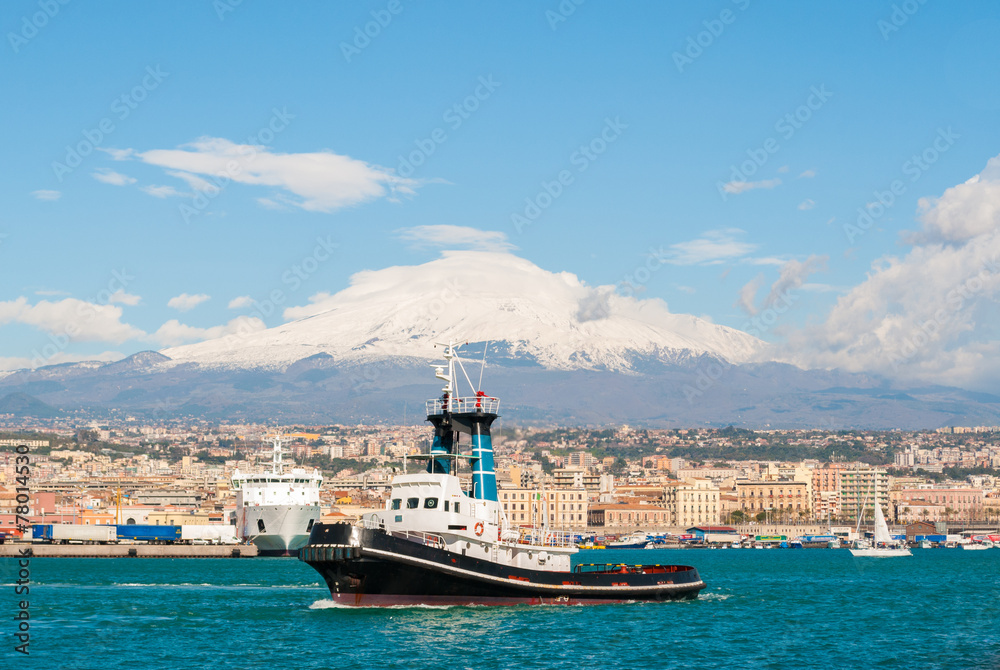 Boat at the harbor of Catania