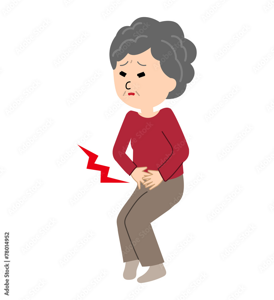 An elderly woman suffering from a stomachache An elderly woman suffering from a stomachache