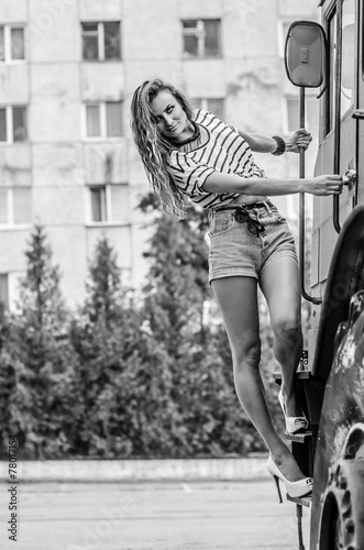 Young sexy girl in blue shorts on the truck © bedya