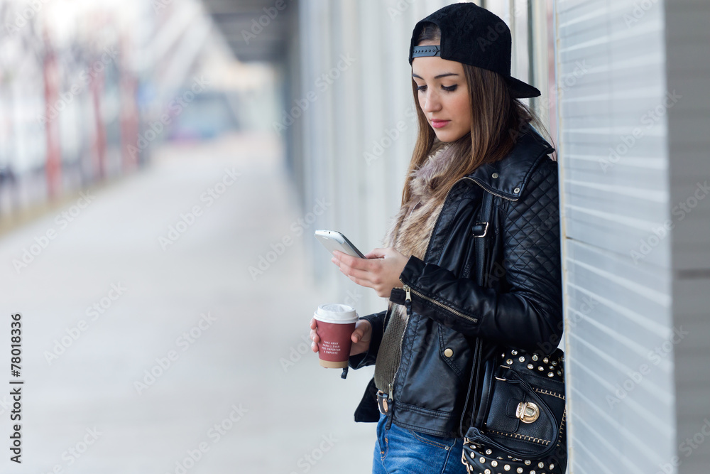 Young beautiful woman with mobile phone and coffee. Young beautiful woman with mobile phone and coffee.