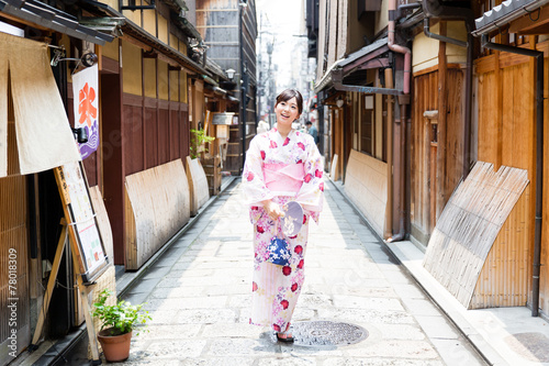 young asian woman wearing kimono © taka