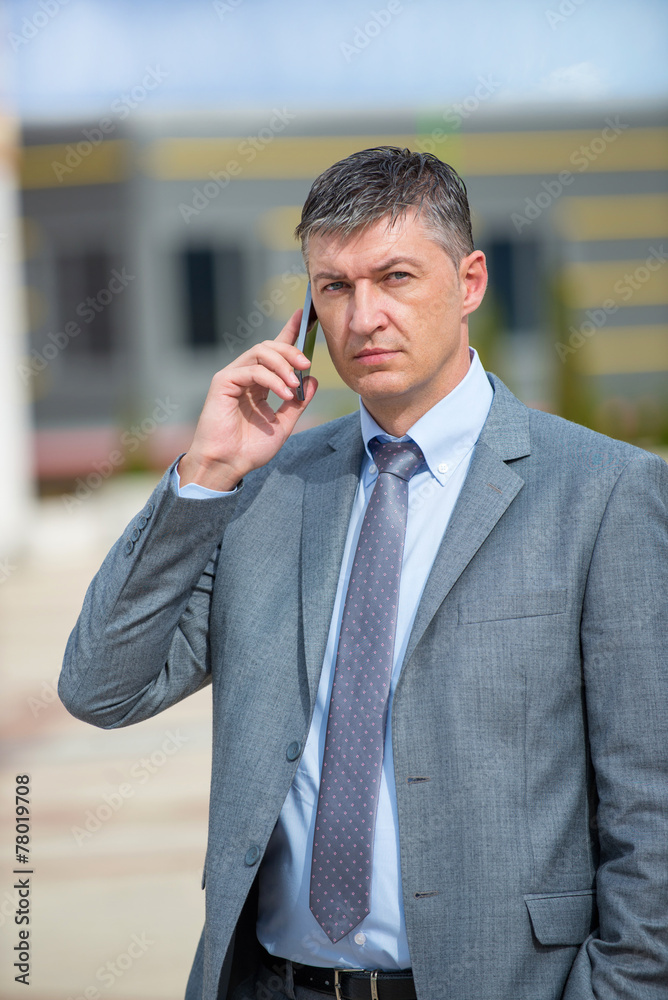 businessman talking on the phone businessman talking on the phone