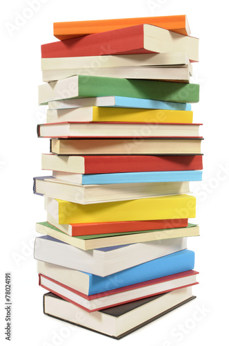 Very tall stack of colorful books