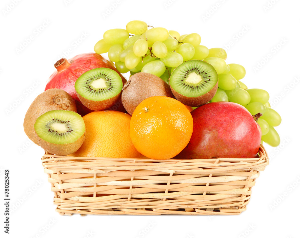 Assortment of fruits in basket isolated on white