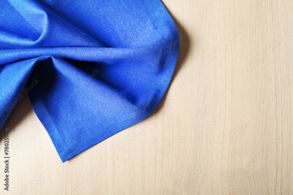 Napkin on wooden table Napkin on wooden table