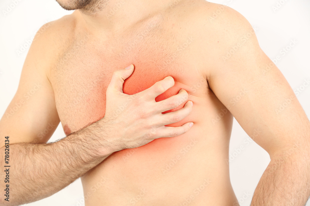 Man having chest pain - heart attack close up Man having chest pain - heart attack close up