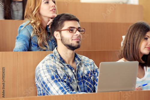Group of students sitting i...