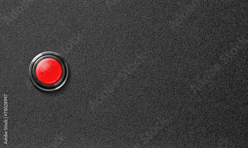 start red push button on black plastic background