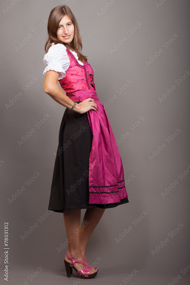 Woman posing in traditional clothing -smiling Woman posing in traditional clothing -smiling