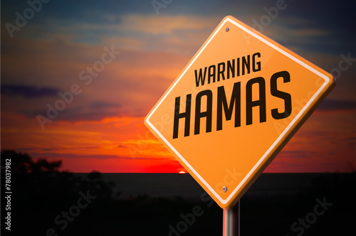 Hamas signboard during sunset photo