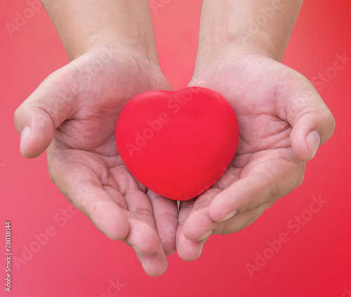 hand holding red heart sent love in Valentine's day with clippin