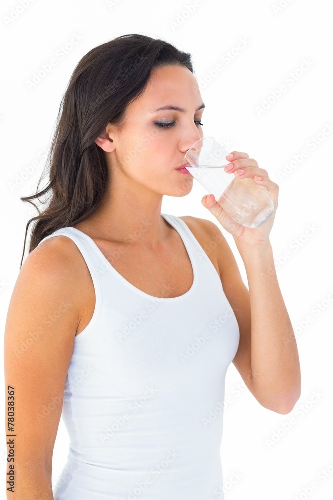 Pretty brunette drinking glass of water Pretty brunette drinking glass of water